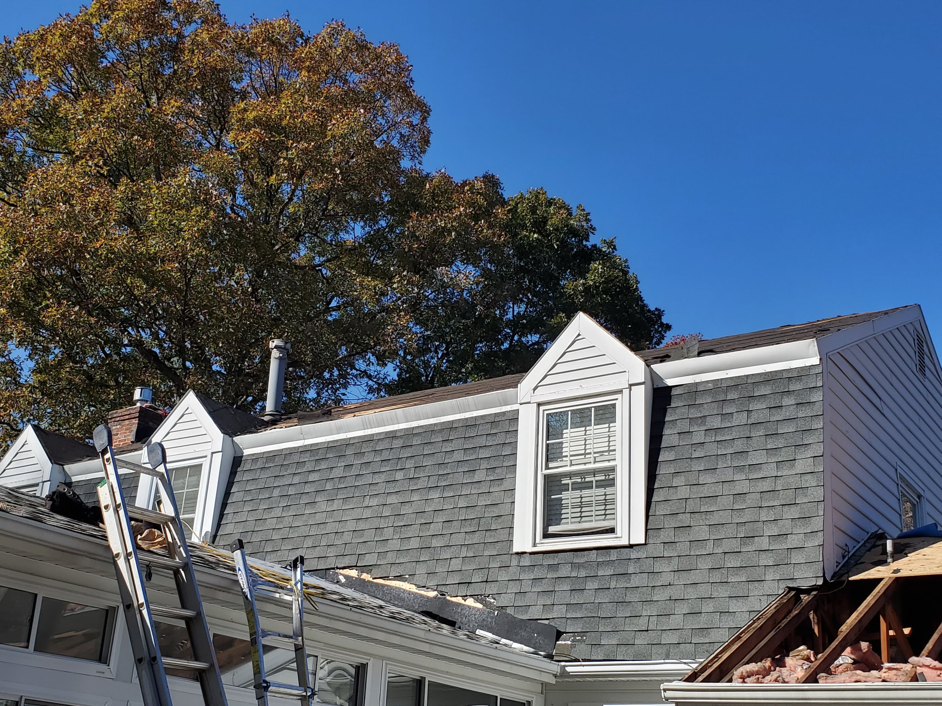 Before dormer construction on a second-floor office roof of a Maryland home